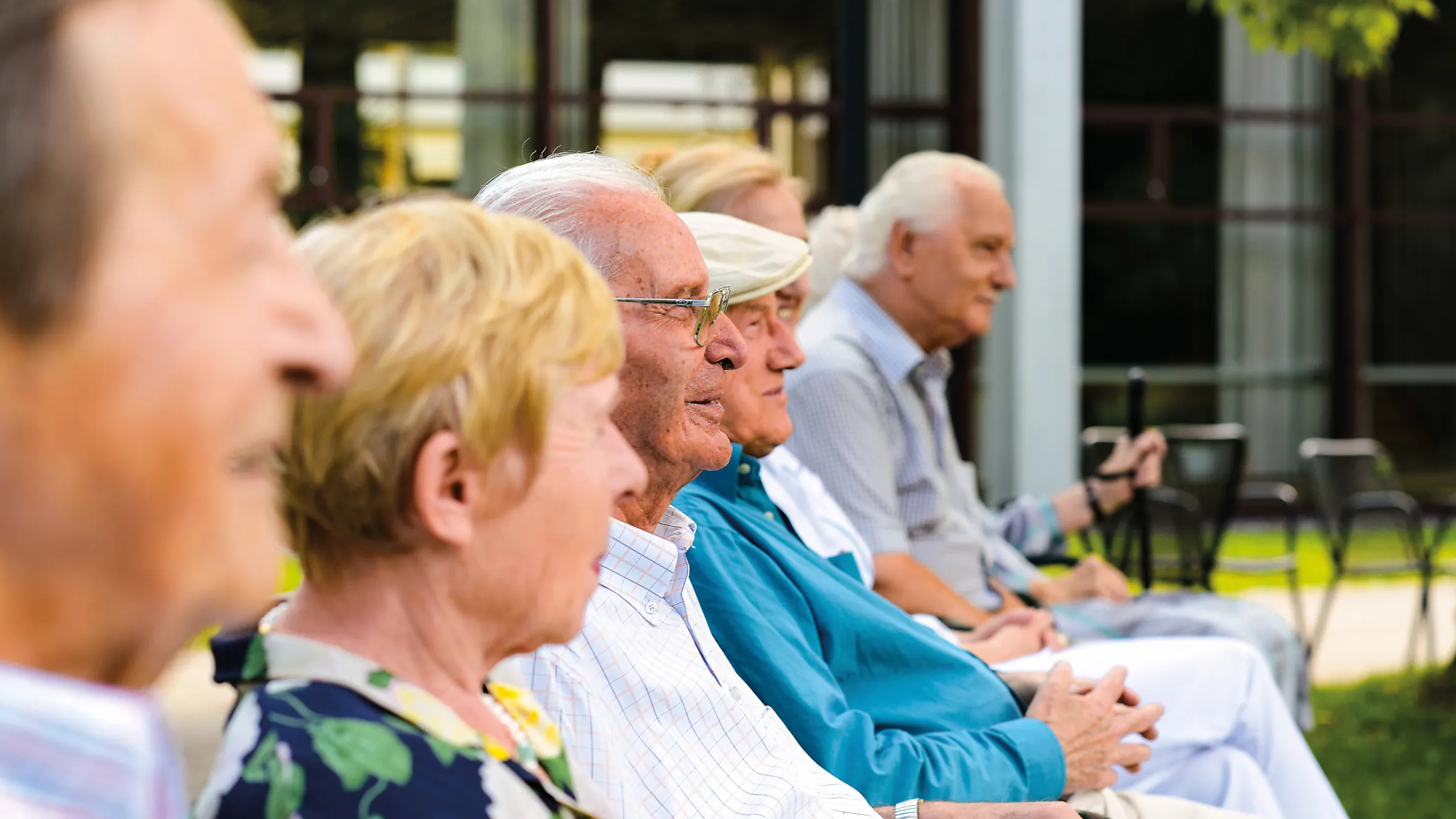 Residents at an event in the home’s extensive park