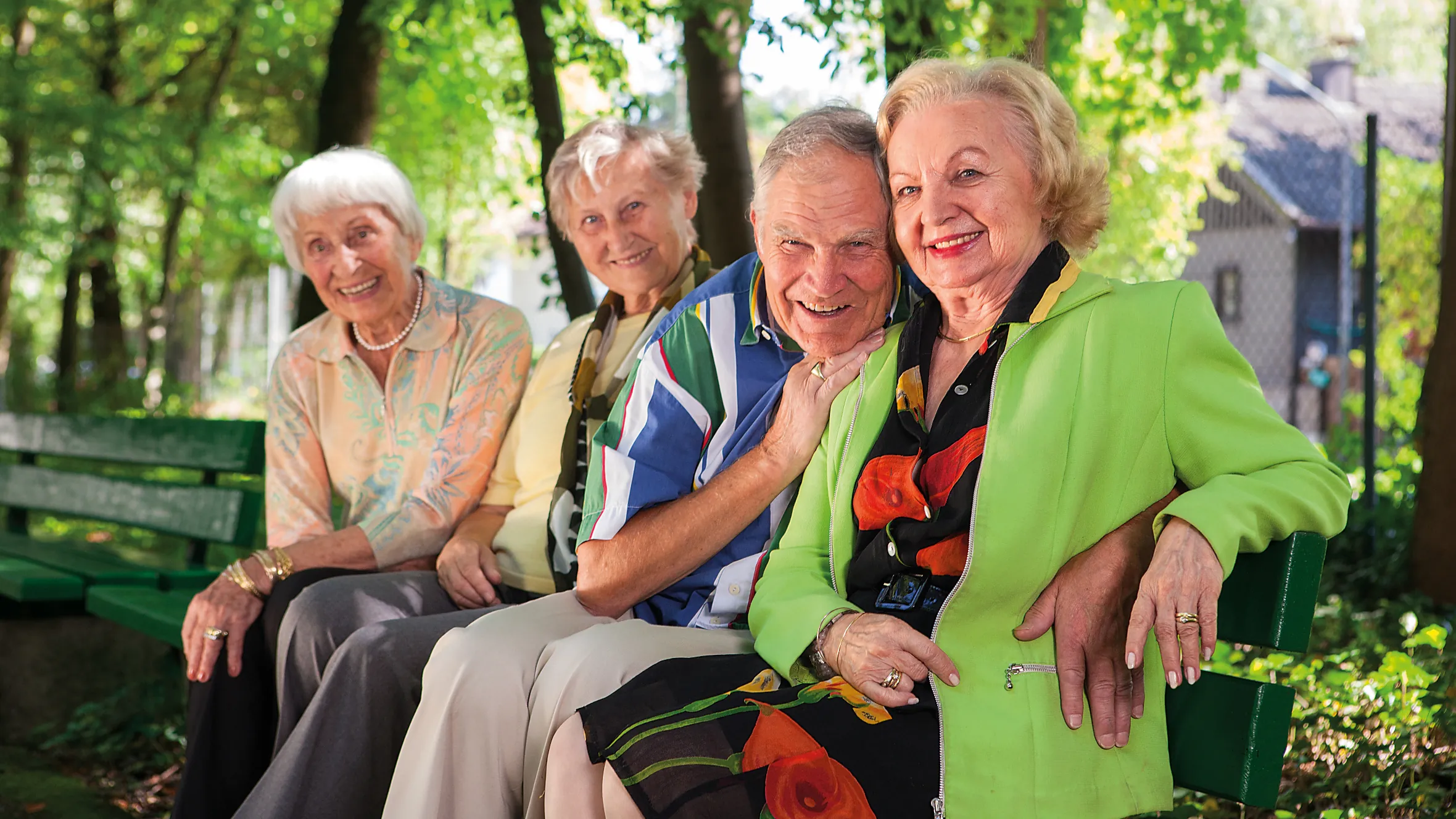 Residents on a bench in the park